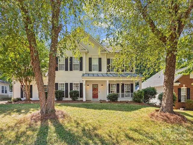 view of front of home featuring a front yard