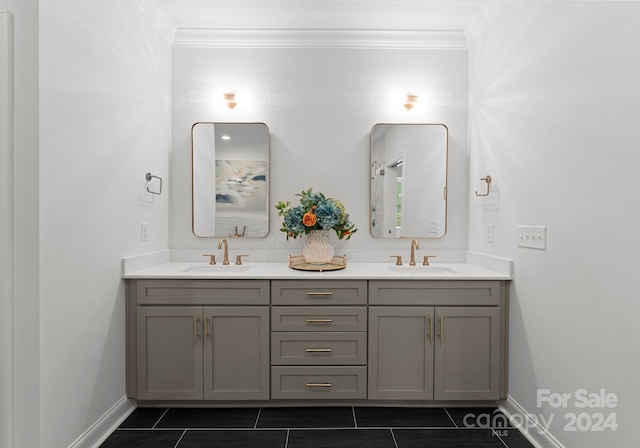 bathroom featuring ornamental molding, tile patterned flooring, and vanity