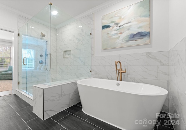 bathroom with separate shower and tub, tile walls, crown molding, and tile patterned floors