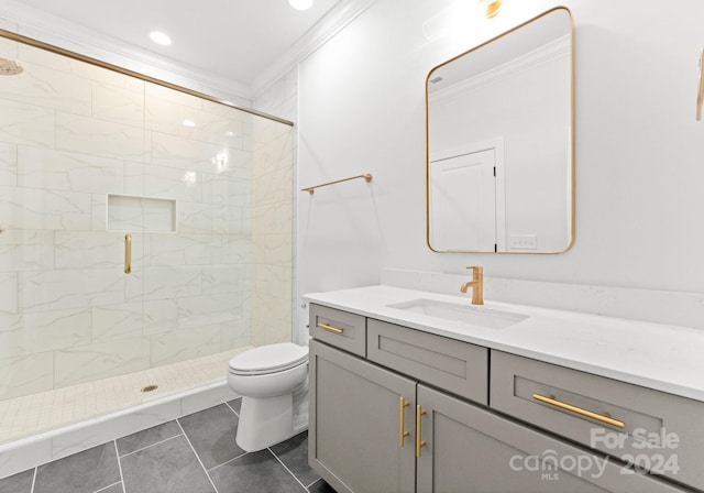 bathroom with vanity, walk in shower, crown molding, tile patterned flooring, and toilet