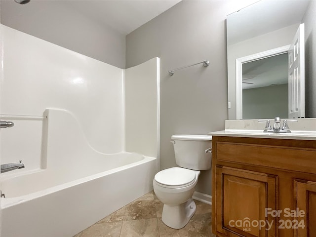 full bathroom featuring vanity, toilet, tile patterned floors, and tub / shower combination