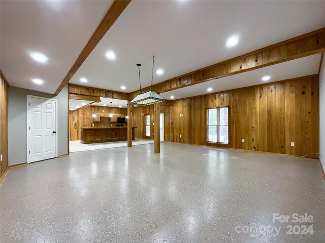 2510 Doster Rd, Monroe, NC 28112 - interior space with speckled floor, baseboards, and wood walls