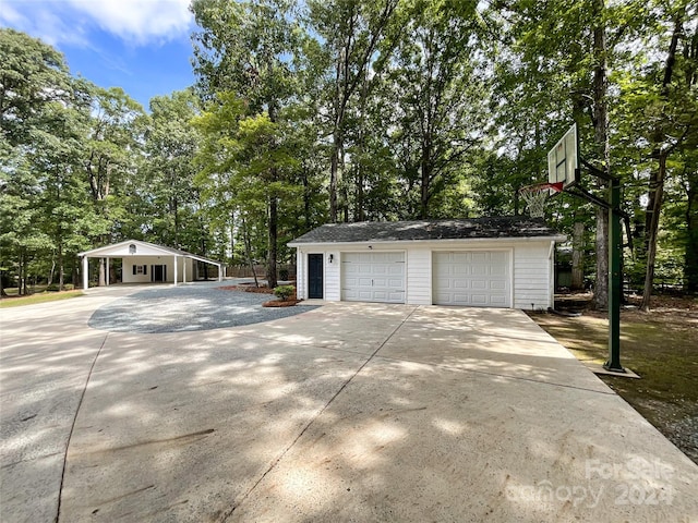 2510 Doster Rd, Monroe, NC 28112 - detached garage featuring a carport