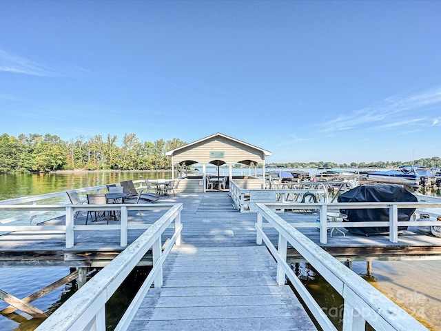 dock area featuring a gazebo and a water view