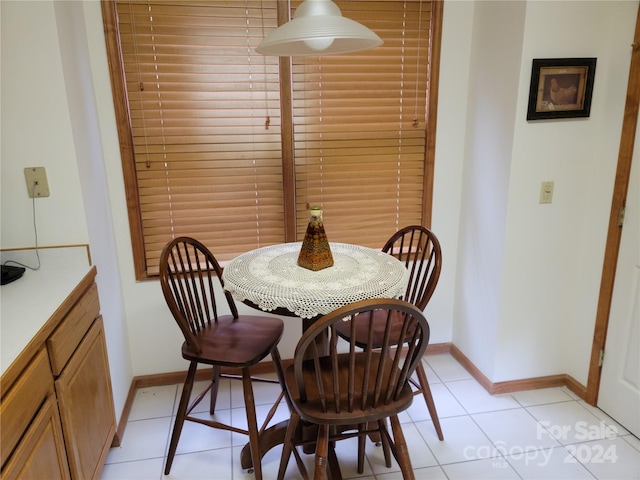 dining room with light tile patterned flooring