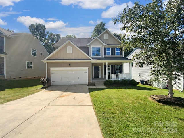 craftsman-style house featuring a garage, a front yard, and a porch