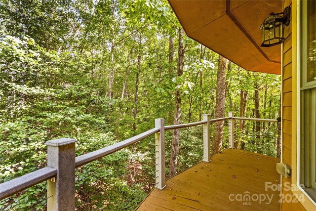 wooden balcony featuring a wooden deck