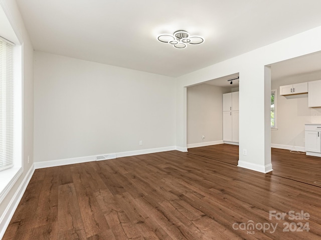 interior space featuring dark wood-type flooring