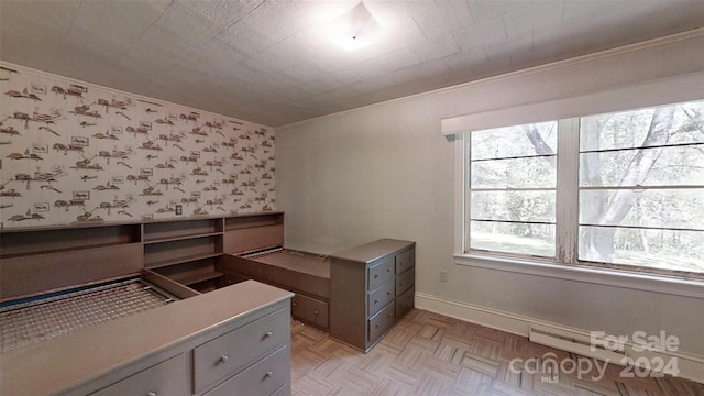 office space featuring ornamental molding and light parquet floors