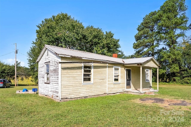 exterior space with a front yard