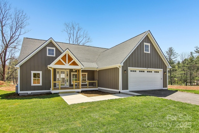 40 Haywood Park Dr, Hendersonville, NC 28791 - modern farmhouse with a porch, asphalt driveway, a front lawn, and a shingled roof