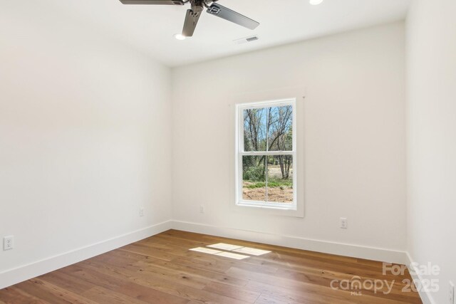 40 Haywood Park Dr, Hendersonville, NC 28791 - empty room with baseboards, ceiling fan, wood finished floors, and recessed lighting