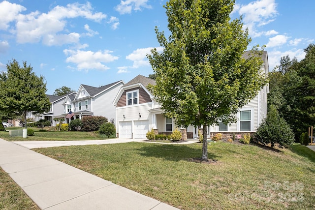 view of front facade featuring a front yard and a garage