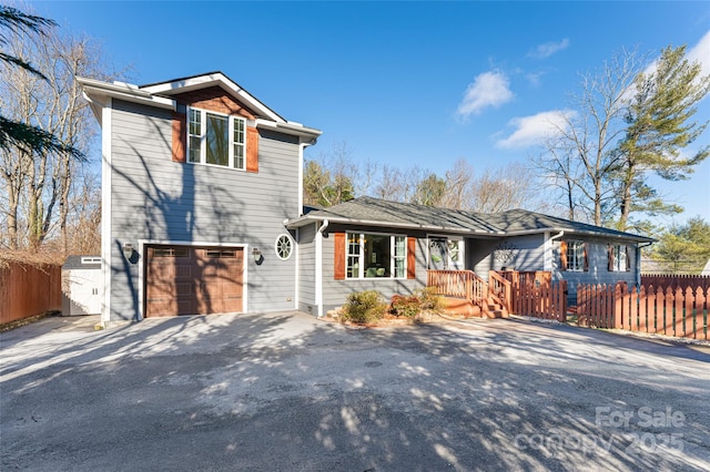 view of front of property featuring a garage