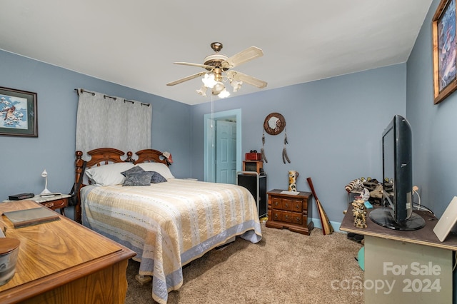 carpeted bedroom with ceiling fan