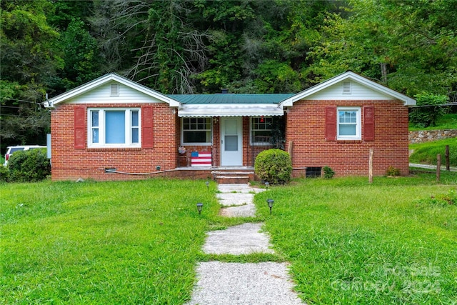 view of front of property with a front yard