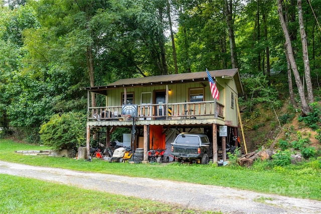 view of front of property with a carport