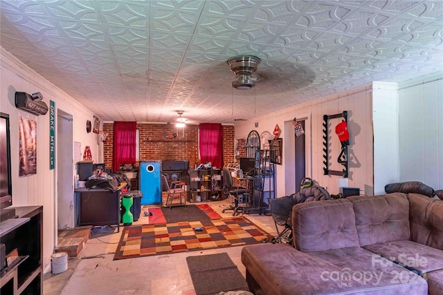 living room with concrete flooring and ceiling fan