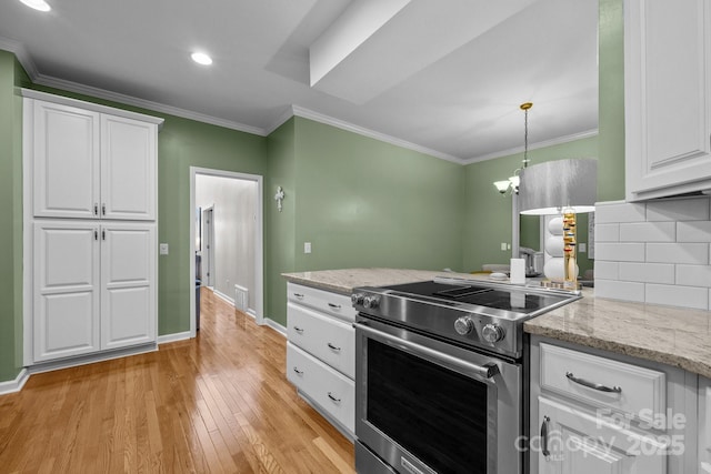 kitchen with white cabinetry, hanging light fixtures, stainless steel electric range oven, and light stone countertops