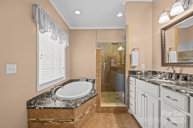 bathroom with tile patterned flooring, vanity, separate shower and tub, and crown molding