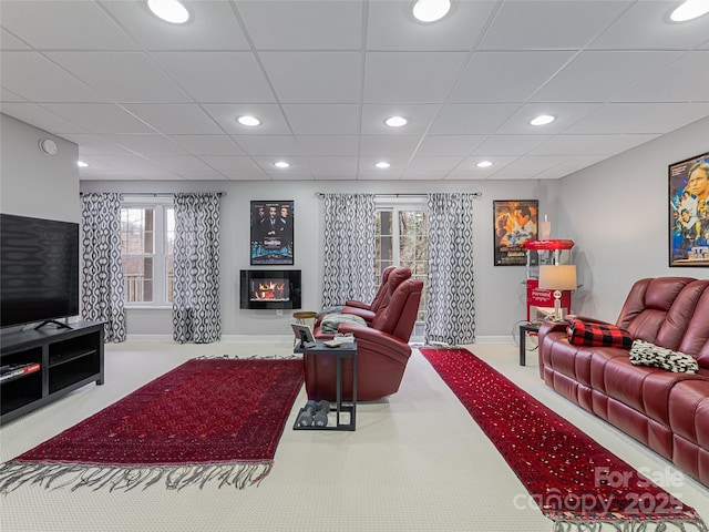 living room with a healthy amount of sunlight and light carpet