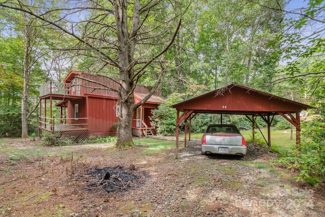 view of yard featuring a carport