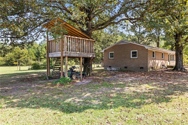 view of yard featuring a deck