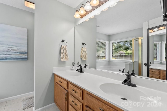 bathroom featuring vanity, a textured ceiling, tile patterned flooring, and shower with separate bathtub