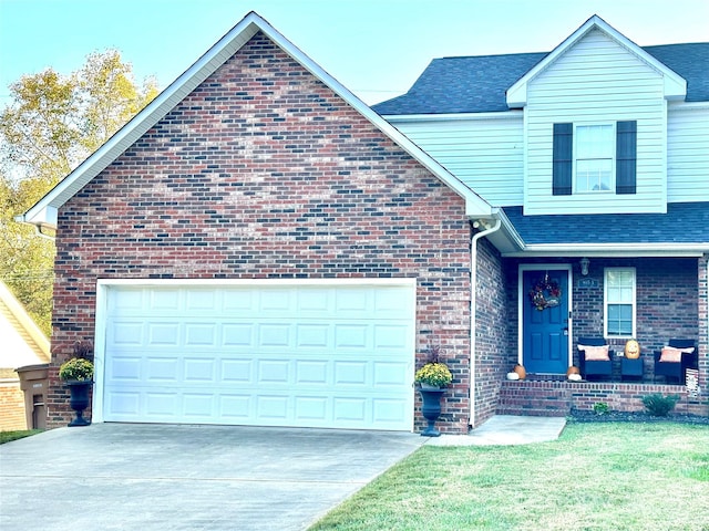 view of property featuring a porch and a garage