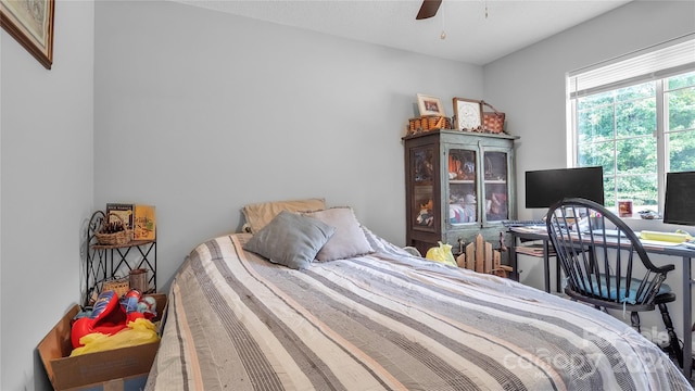 bedroom featuring ceiling fan