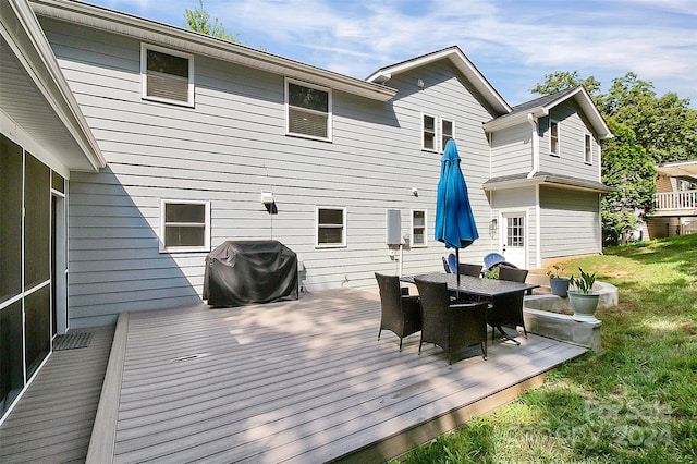 exterior space featuring area for grilling and a lawn