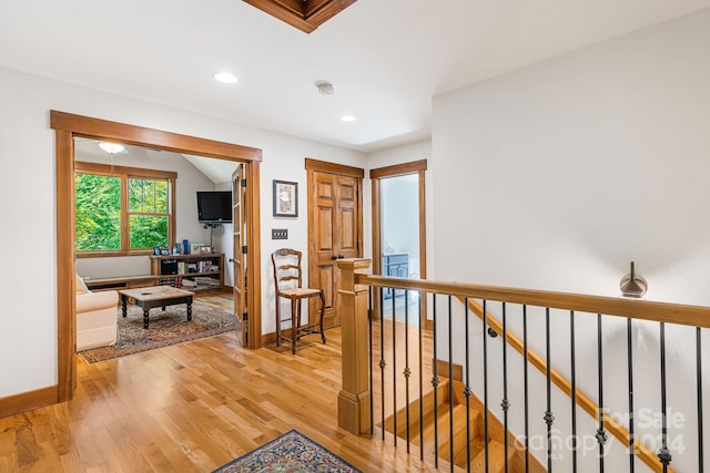 hall with light wood-type flooring