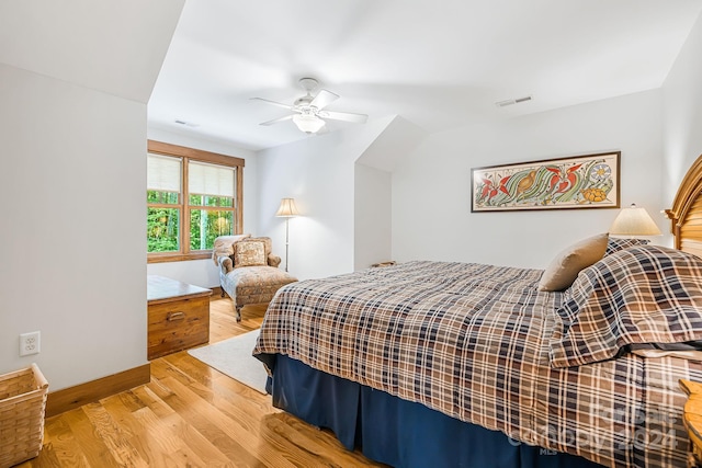 bedroom featuring wood-type flooring and ceiling fan