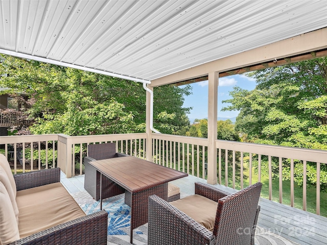 deck featuring outdoor lounge area