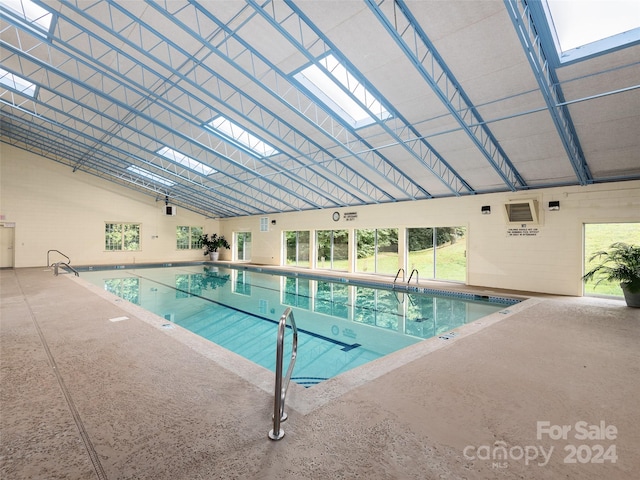 view of pool with a skylight