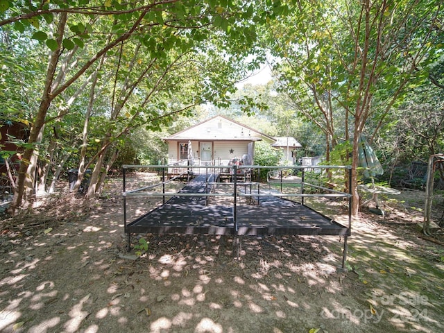 view of yard featuring a wooden deck