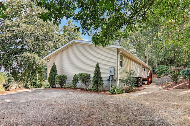 view of home's exterior featuring driveway