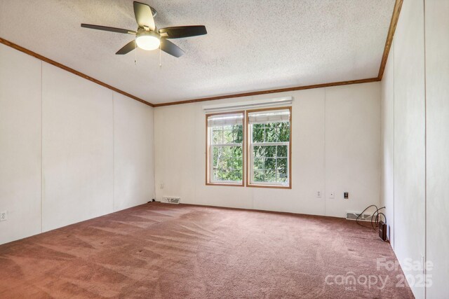 18 Spencer Rd, Candler, NC 28715 - carpeted spare room featuring ornamental molding, a textured ceiling, and ceiling fan