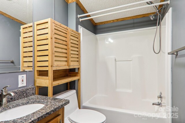 18 Spencer Rd, Candler, NC 28715 - bathroom with a textured ceiling, shower / bath combination, vanity, toilet, and crown molding