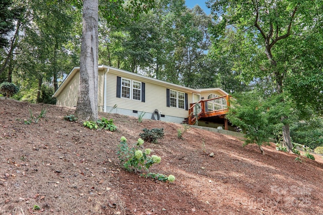 18 Spencer Rd, Candler, NC 28715 - single story home with a deck, crawl space, and stairway