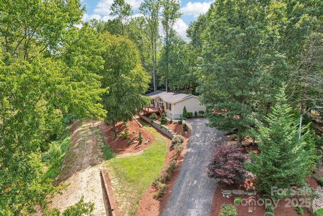 18 Spencer Rd, Candler, NC 28715 - view of front facade with driveway and a wooded view