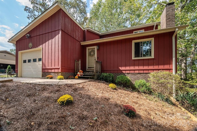 view of front of property with a garage