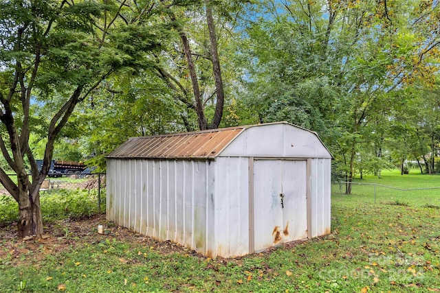 view of outdoor structure with a yard