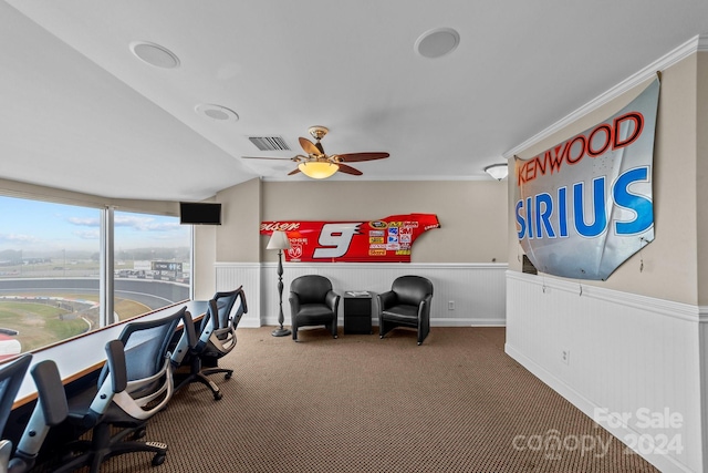 carpeted office with ceiling fan, lofted ceiling, and ornamental molding