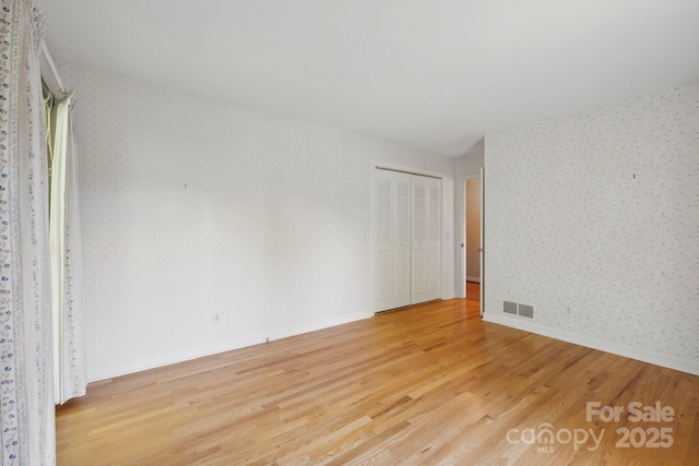 empty room featuring light wood-type flooring