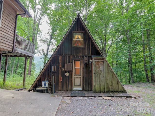 view of front facade with an outbuilding