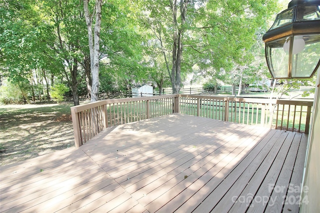 deck with a storage shed