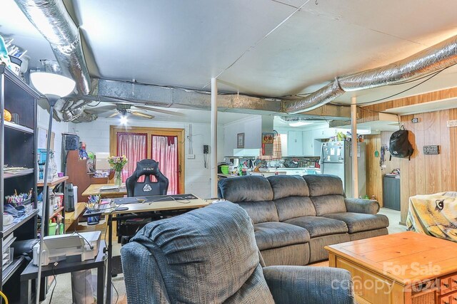 living room featuring ceiling fan