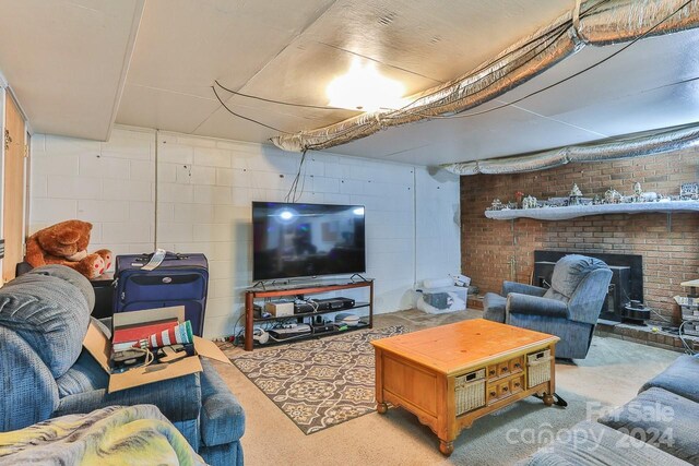 living room featuring a fireplace