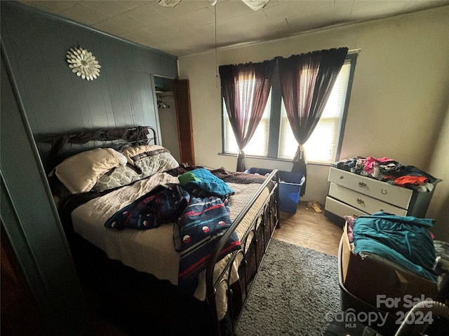 bedroom featuring hardwood / wood-style floors